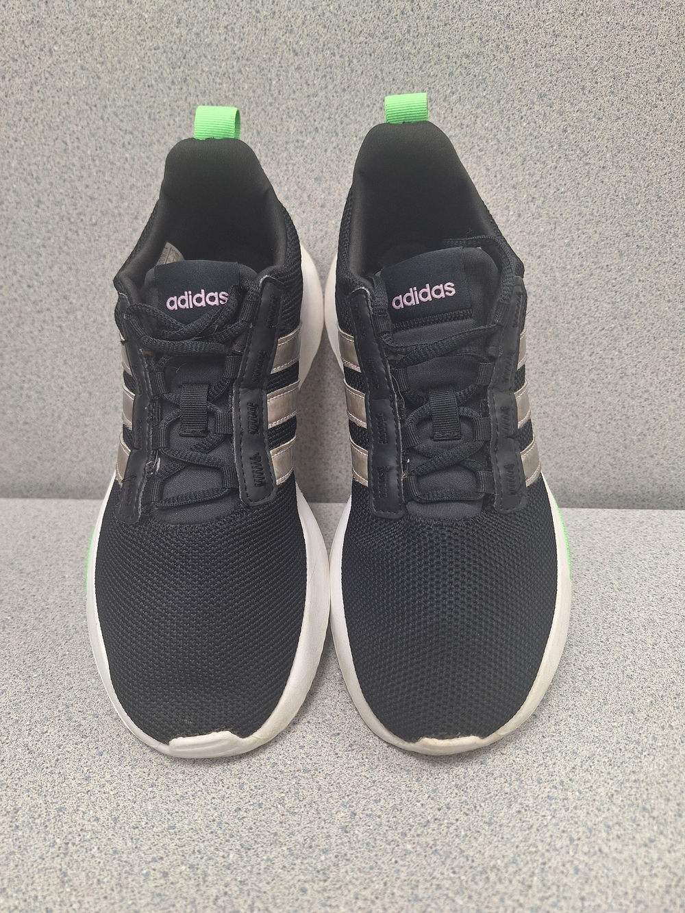 Adidas Black Athletic Sneakers with Neon Green Pull Tabs and Silver Stripes